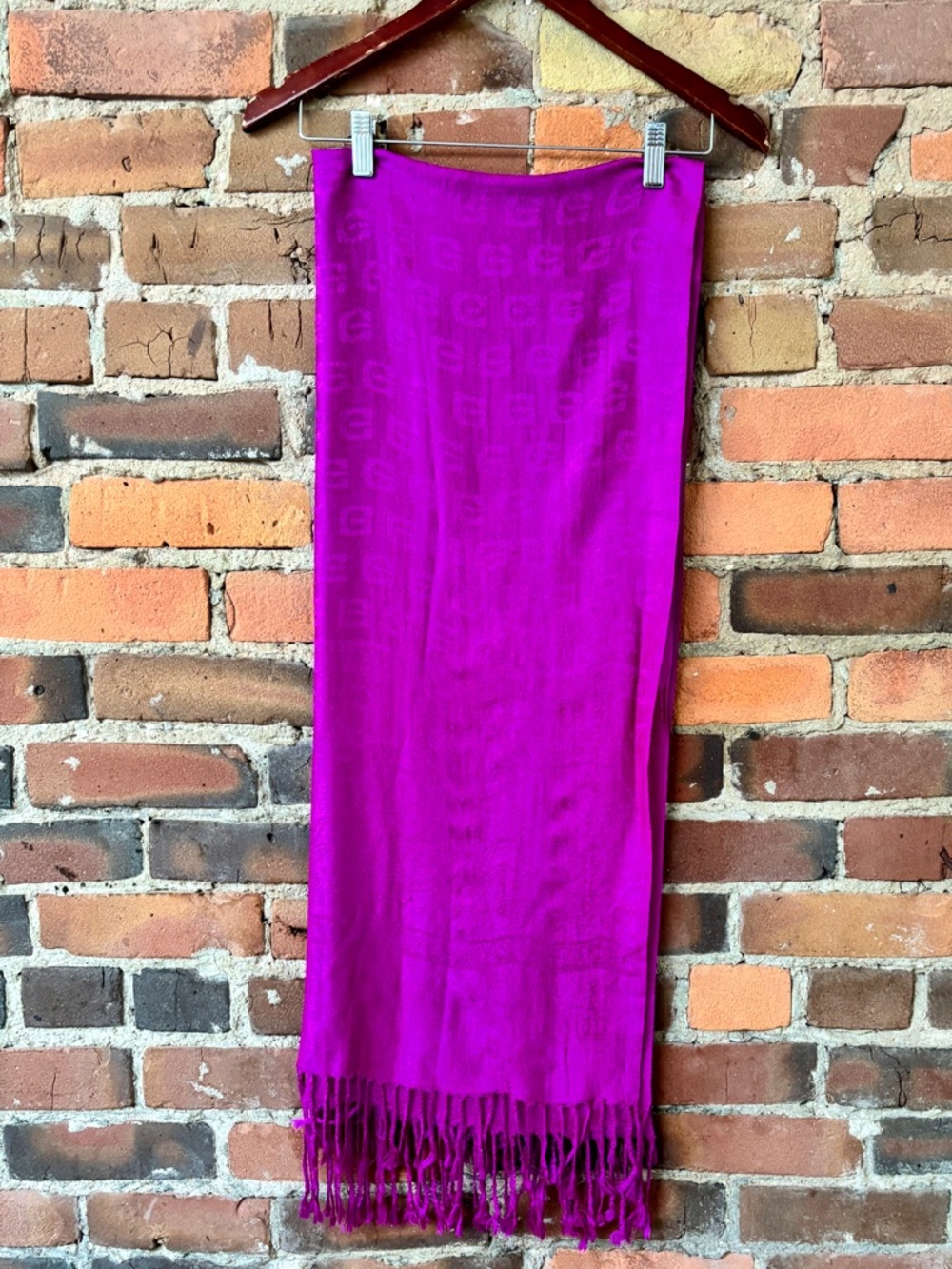 Fuchsia Woven Scarf with Geometric Pattern & Fringe Trim.